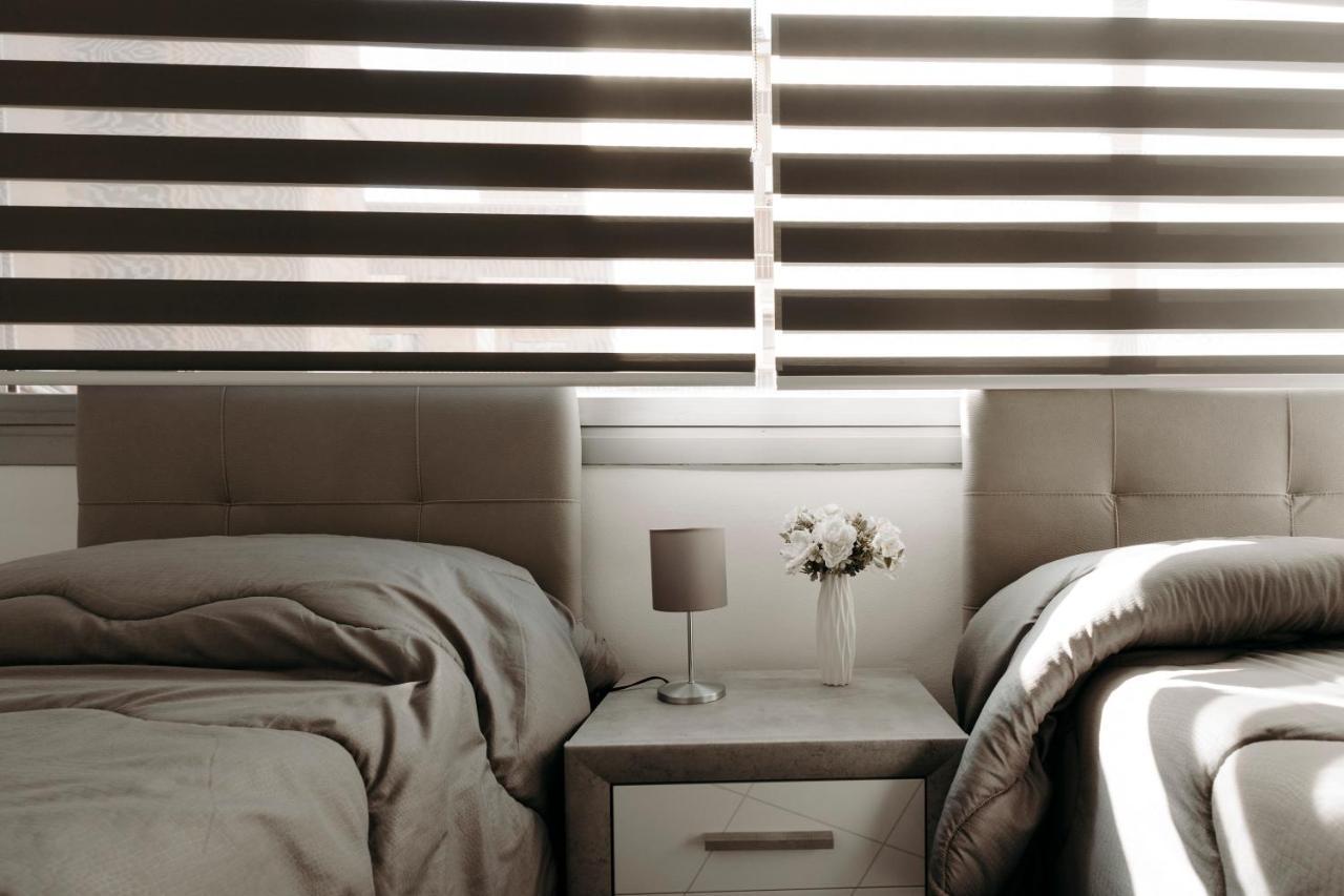 Tweepersoonskamer met 2 Aparte Bedden