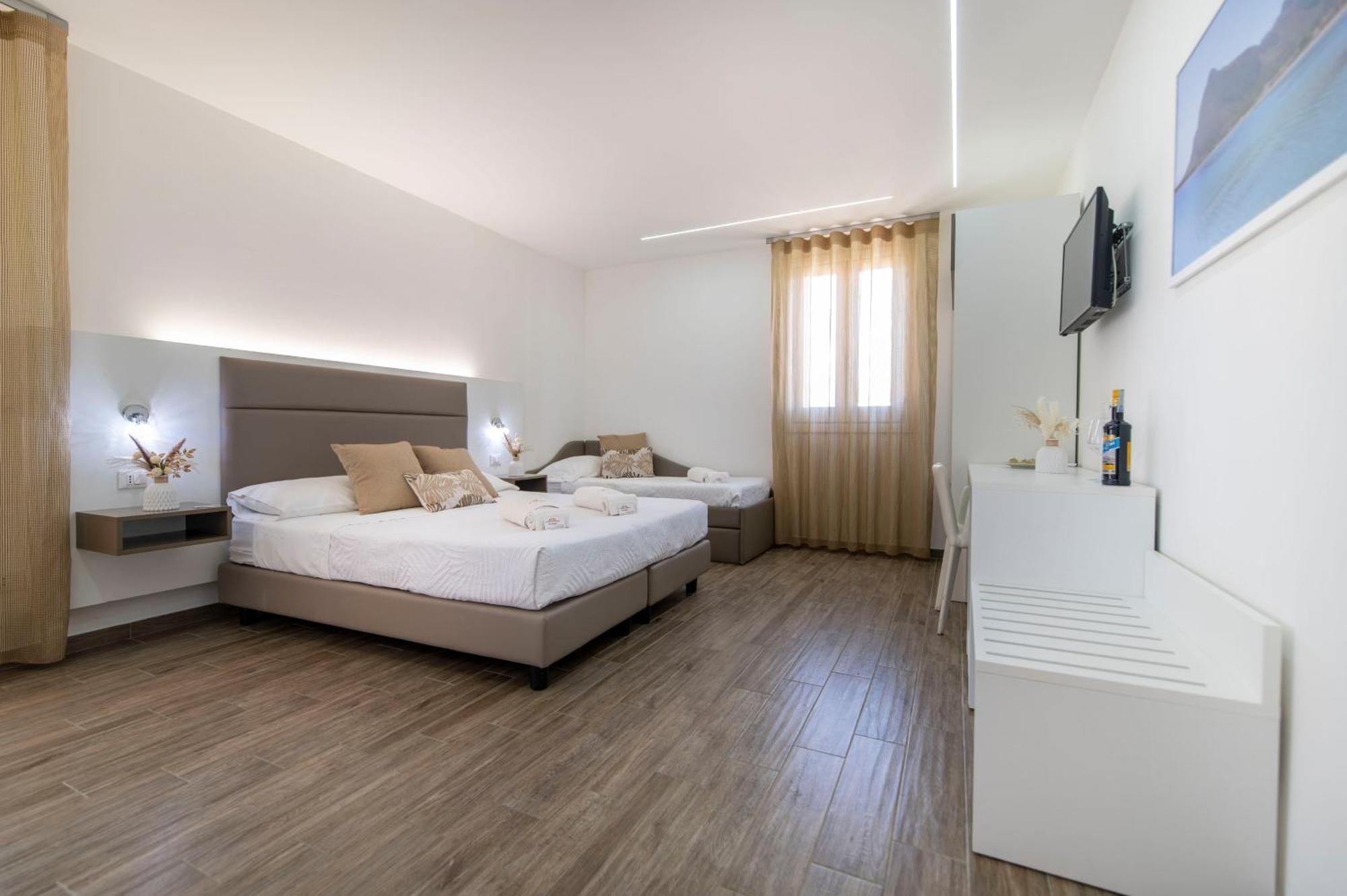 Camera Matrimoniale Deluxe con 1 Letto Supplementare