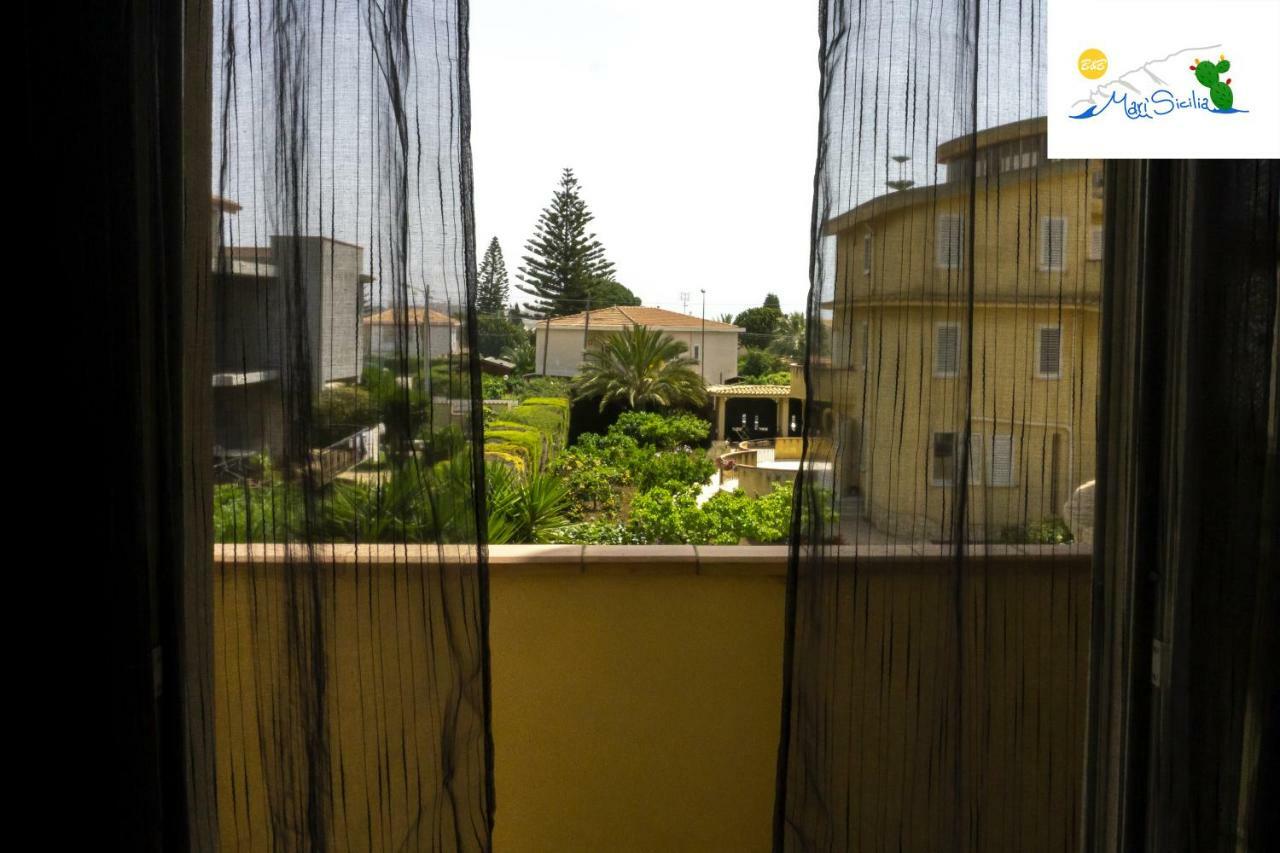 Camera Tripla con Vista Giardino